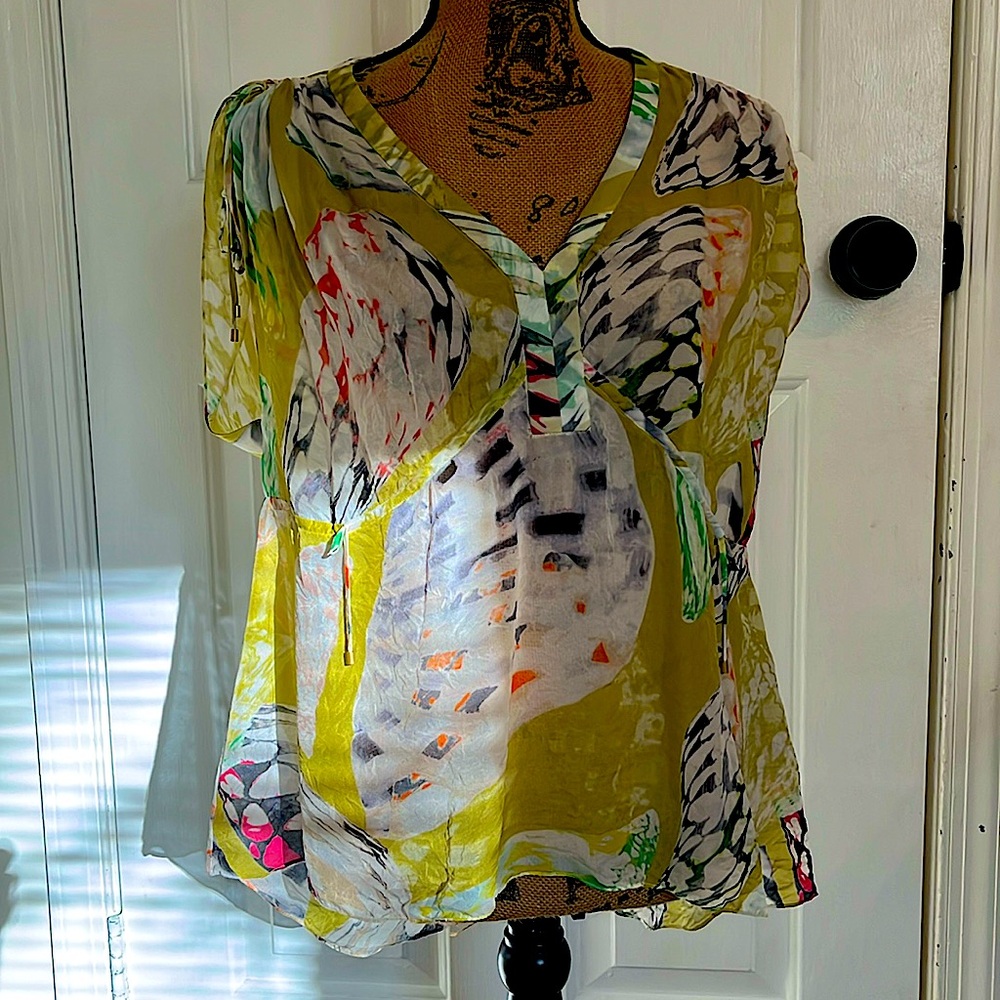 Gently used, sheer, multicolors, cap sleeves that tie have a drawstring